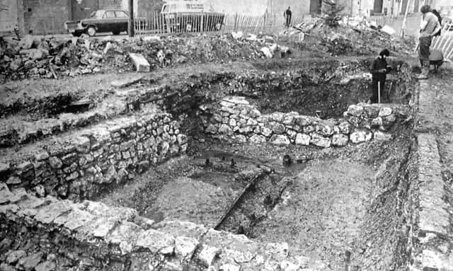 The area being excavated at Oyster Street. The picture shows the 15th-century wooden quay and the 17th century stone structure