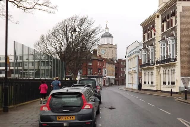 A modern look along Pembroke Road. Note that one of the cathedrals clock faces has disappeared.