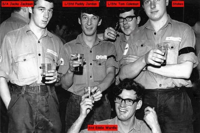 Dressed in their best Number 8s working dress and black armbands are Jacky Jackson, Paddy Jordan, Tom Coleman and Stokes with Eddie Wardle kneeling in front. They were serving in HMS Ark Royal.