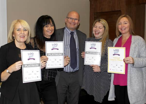 Wightlink business operations support manager Elaine Winkles, cabin assistant Debbie Gallier, passenger services co-ordinator Steve Brett-Hill, cabin assistant Nancy Byng and customer experience lead Sara Howden at the Loo of the Year award ceremony