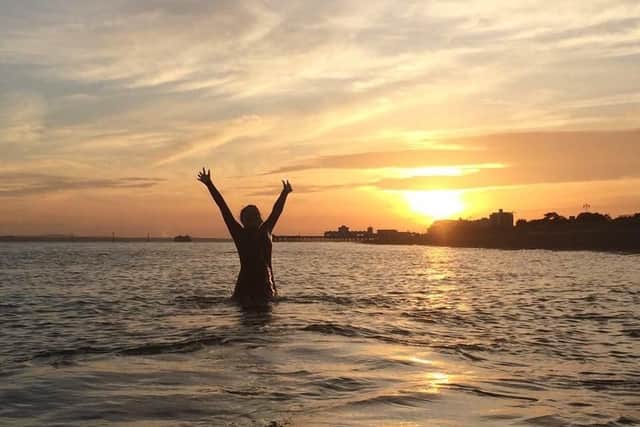 A member of the Portsmouth Triathletes enjoys a dip at Eastney. You can join for next to nothing - another brilliant, low-cost activity in Portsmouth Credit: Elliot Webber