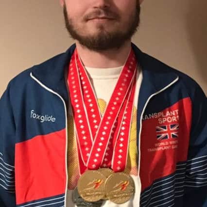 Sam Roonan with his medals after the World Transplant Winter Games