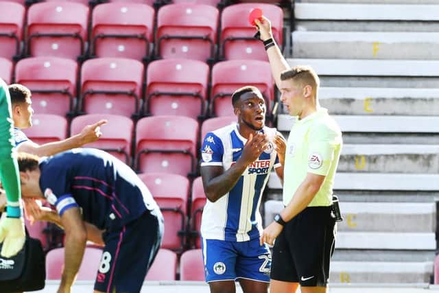 Robert Jones sent off Chey Dunkley against Pompey earlier this season. Picture: Joe Pepler