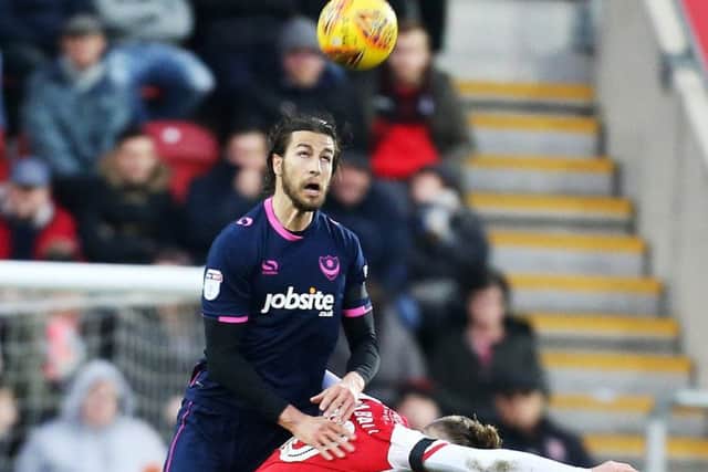 Christian Burgess wins a header against Rotherham. Picture: Joe Pepler