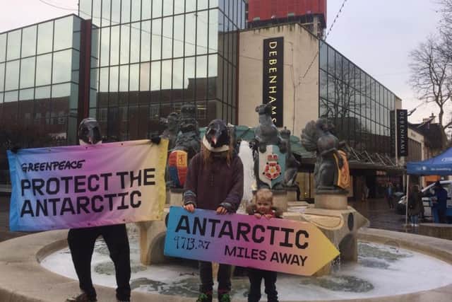 Portsmouth Greenpeace 'penguins' in Commercial Road