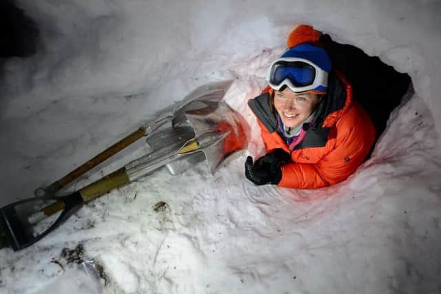 Major Nics Wetherill crawls into a snow shelter during training Picture: Cpl Jamie Dudding RLC