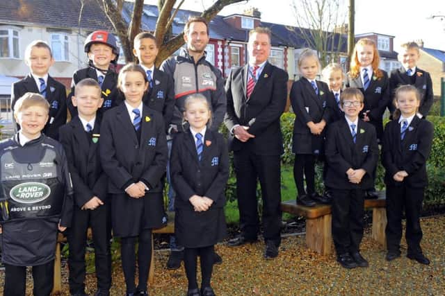 Sir Ben Ainslie with Mayfield School pupils. Picture by Malcolm Wells