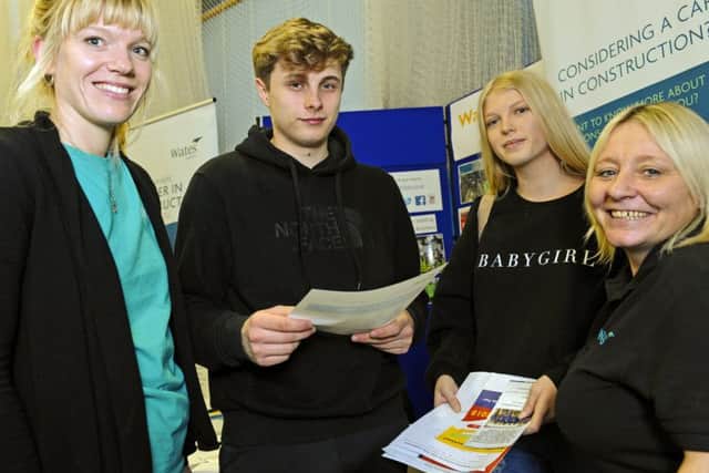 Nina Hughes representing Wates, with Ollie Belton and Shania Money, with Michelle McSorley, also from Wates                            Picture: Malcolm Wells (180125-4897)