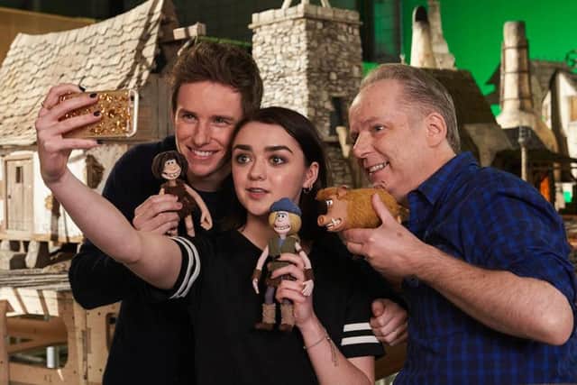 Eddie Redmayne, Maisie Williams and Nick Park lark about.