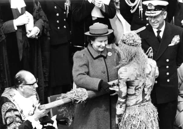 The Queen greets one of the Bararroga Mimi aboriginal dancers in Guildhall Square, Portsmouth, in 1987 PP5475 PPP-160406-152448001