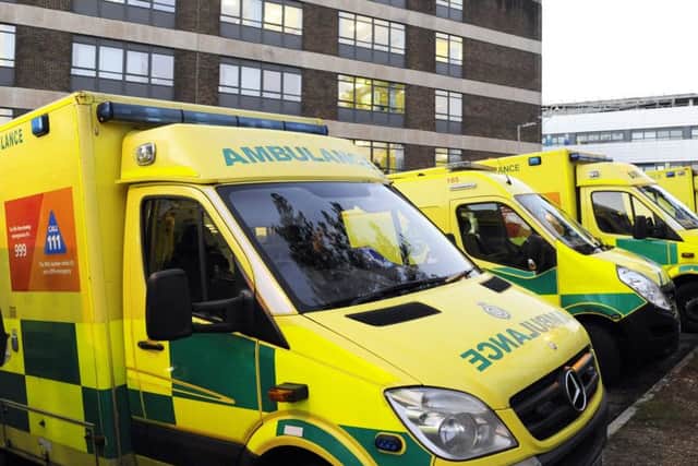 Ambulances queueing at the access road to the Accident and Emergency entrance to The Queen Alexandra Hospital in Cosham
