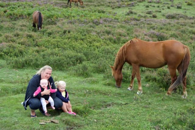 Charmaine Botes with her daughters Makayla Williams, four, and Brooke Williams, 10 months at the New Forest
