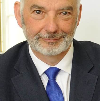 Police and crime commissioner Michael Lane
