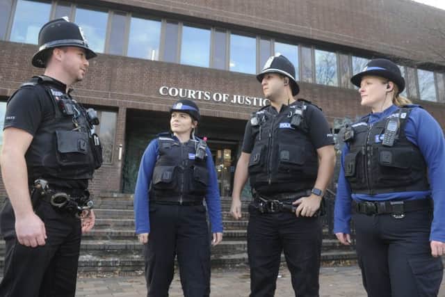 Stock image of police outside Portsmouth Crown Court. Picture Ian Hargreaves (180012-1) PPP-180401-171246006