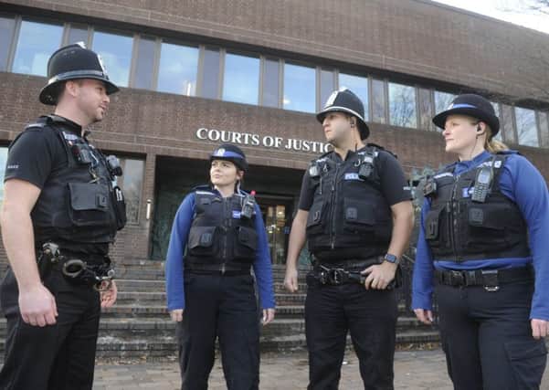 Stock image of police outside Portsmouth Crown Court. Picture Ian Hargreaves  (180012-1) PPP-180401-171246006