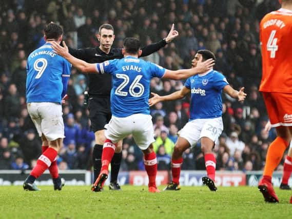 Pompey saw strong appeals for a first-half penalty waved away by referee David Coote