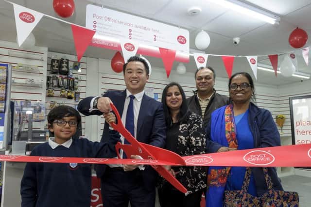 Eight-year-old Saksham Thakur, Alan Mak MP, Kanchan and Manish Thakur and Saroj Thakur celebrate as Eastoke Post Office is declared open