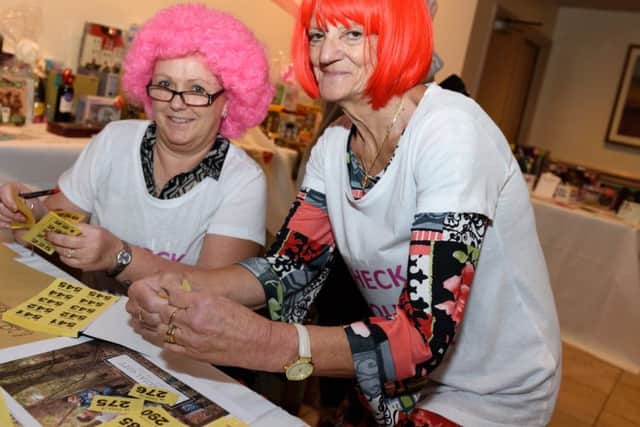 Sue Bridger, left, and Sharon Wright organise the raffle
(180089_001)