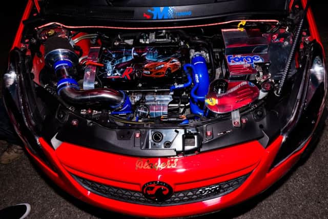 Even under the bonnet this sleek car was pristine