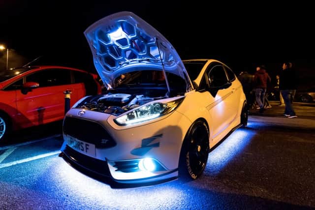 The owner of this motor ensured it dazzled with light - even under the bonnet