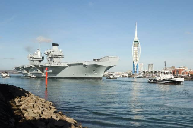 HMS Queen Elizabeth as she left Portsmouth for the first time last year   Photo: LPhot Rory Arnold
