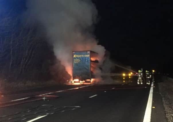 The lorry on fire on the A3(M). Credit: Horndean Fire Station