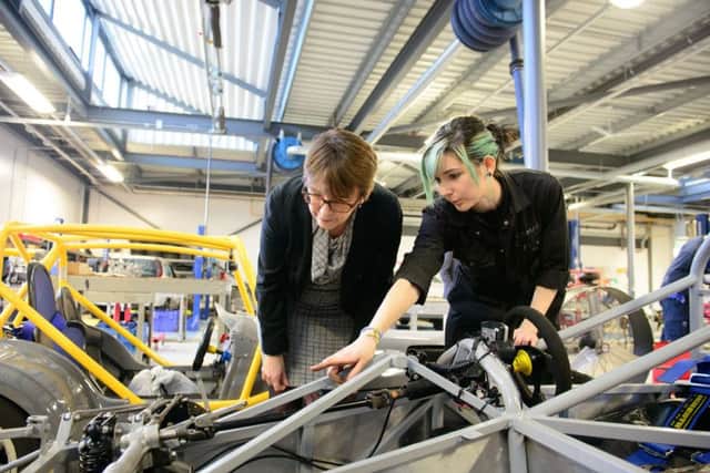 Philippa Lloyd, Director General of Higher and Further Education at the Department of Education with a student at the CEMAST centre