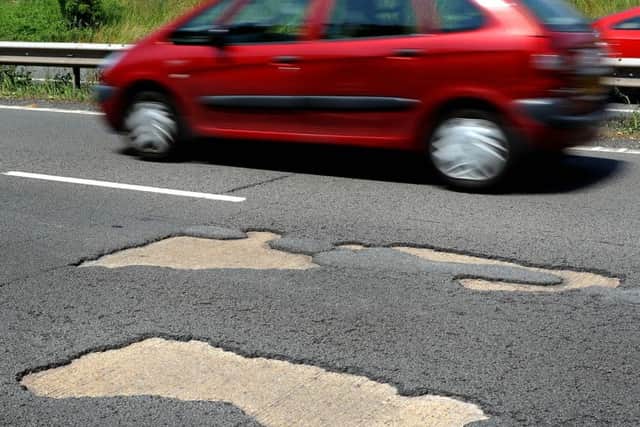 Potholes on the A27 between Chichester and Portsmouth. Picture: Steve Robards