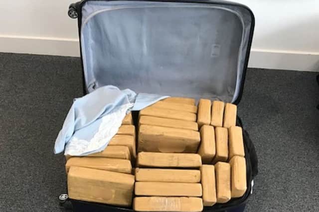 A suitcase containing packages of cocaine. Picture: Border Force/PA Wire