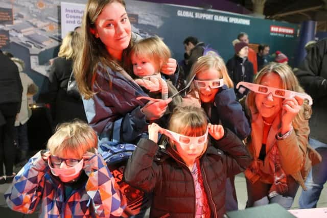 Catherine Riddett, Rupert 1, Alasdair 4, Iris 5, Lilly 9 and Amanda Gregory using special glasses to observe glowing gas at an evening of astronomy, stargazing, space activities, cosmology chat and talks.
Picture: Habibur Rahman
