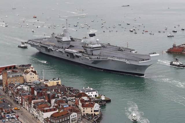 HMS Queen Elizabeth's departure from Portsmouth has been delayed because of sprinkler problems. Picture: LPhot Kyle Heller