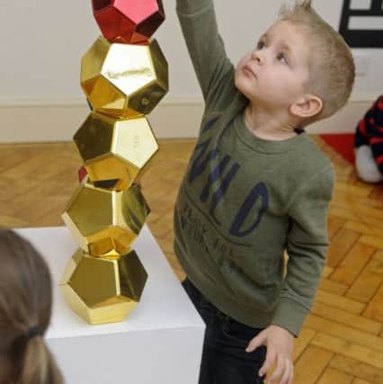 Lucas Knight getting hands-on with art at the Gosport Play Gallery (180020-04)