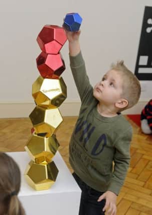 Lucas Knight getting hands-on with art at the Gosport Play Gallery (180020-04)