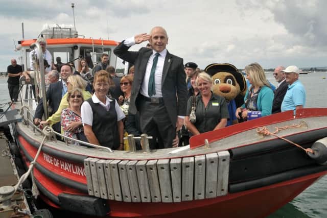 Wayne Sleep, centre, at the re-launch of the Hayling Ferry in 2016. Credit: Mic Young