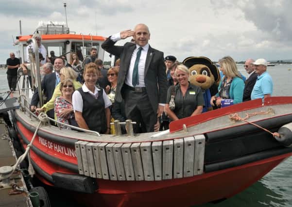 Wayne Sleep, centre, at the re-launch of the Hayling Ferry in 2016. Credit: Mic Young