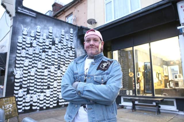 Artist Samo White outside Play Dead tatoo and art gallery   Picture : Habibur Rahman