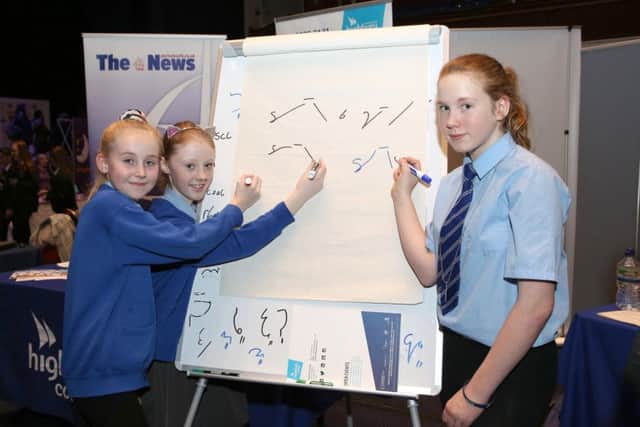 Molly Babbage 10, Teegan Lee, 10, and Maddie Edmonds 11 from St Columba School learning how to write short hand  (IMG_6470)