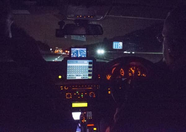 Inside the unmarked police BMW as it heads towards an ongoing car chase in the north of the county.  Picture: Blackball Media/Press Association