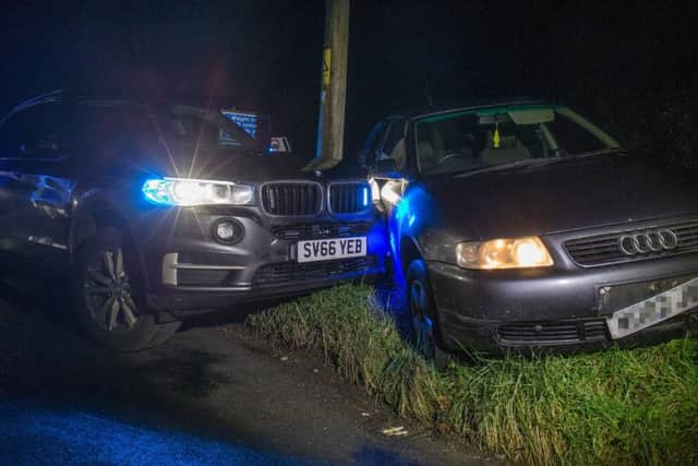 An unmarked BMW X5 police car performs a tactical stop on an Audi A3, the driver of which led officers on a chase around north Hampshire after failing to stop.  Pictures: Blackball Media/Press Association