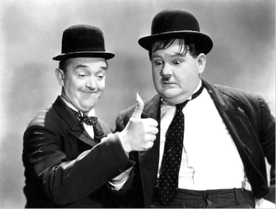 Stan Laurel and Oliver Hardy in Way Out West, 1937