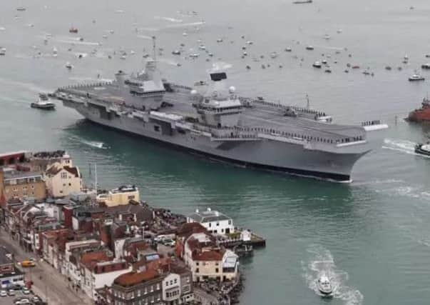 HMS Queen Elizabeth is due to depart from Portsmouth today.