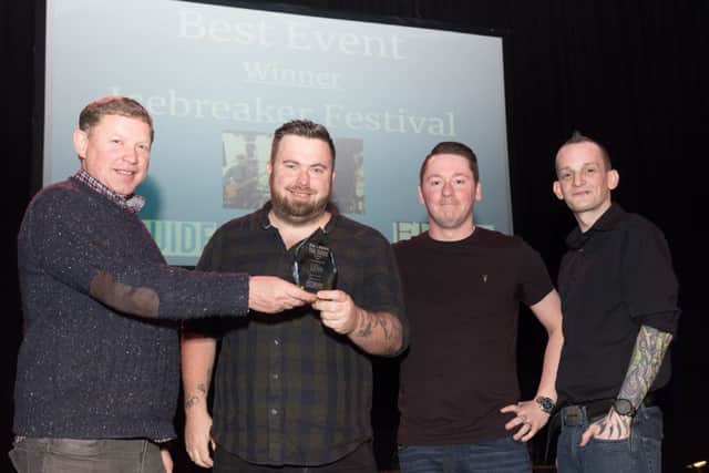 The Icebreaker team receive their Best Event trophy from Nick Courtney of the Victorious Festival at The Guide Awards. Picture: Keith Woodland