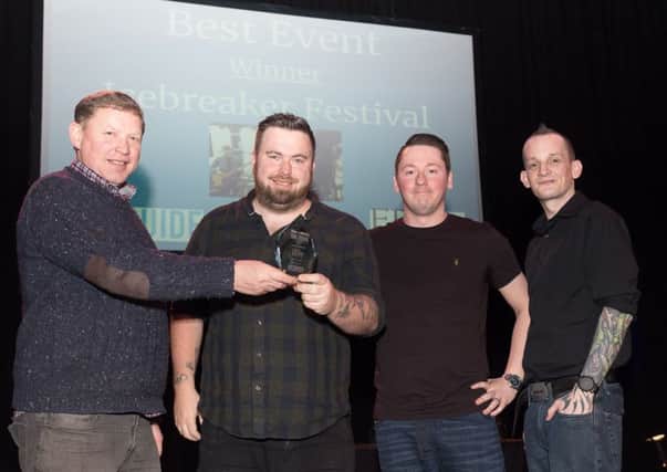 The Icebreaker team receive their Best Event trophy from Nick Courtney of the Victorious Festival at The Guide Awards. Picture: Keith Woodland