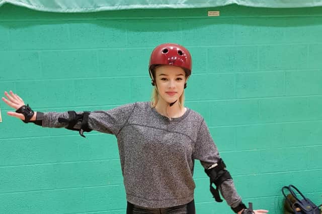 Millie Salkeld, AKA, Mills and Doom, pulls on her skates and gives roller derby a try