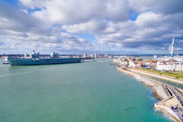 HMS Queen Elizabeth leaving Portsmouth. Picture: Ryan Atfield (NOT FOR RESALE)