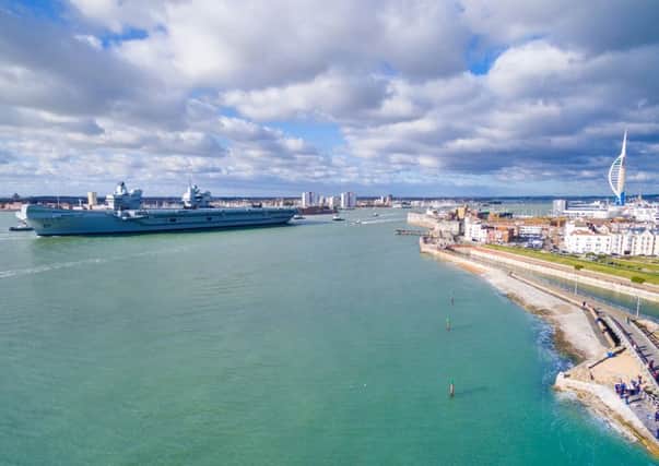 HMS Queen Elizabeth leaving Portsmouth. Picture: Ryan Atfield (NOT FOR RESALE)