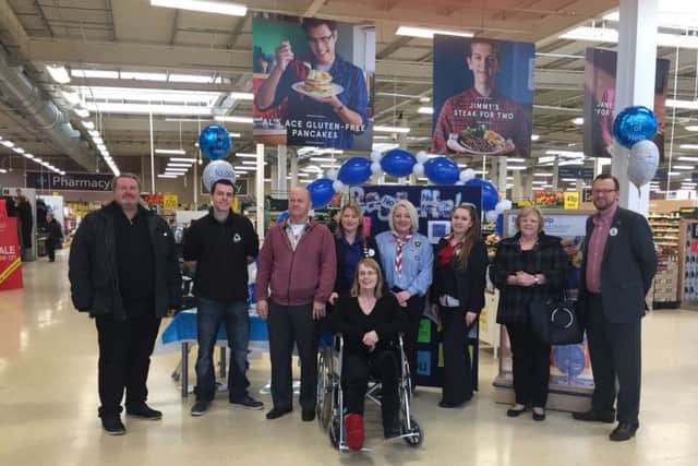 Tesco staff and community volunteers at the launch of this year's Bags of Help campaign
