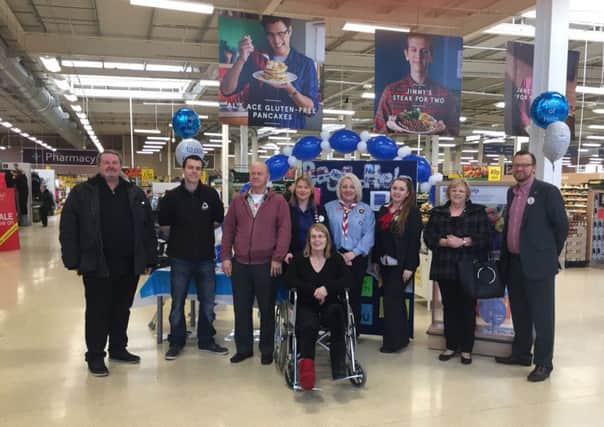 Tesco staff and community volunteers at the launch of this year's Bags of Help campaign