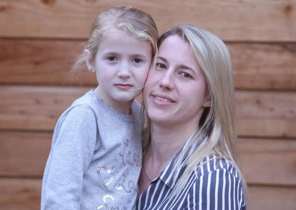 Michelle Frank pictured with her daughter, Emma six, at their home in Paulsgrove. 

Picture Habibur Rahman