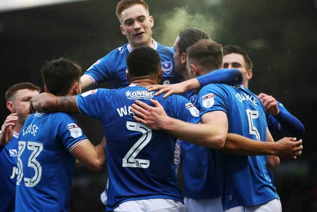 Pompey celebrate Anton Walkes' goal against Doncaster. Picture: Joe Pepler
